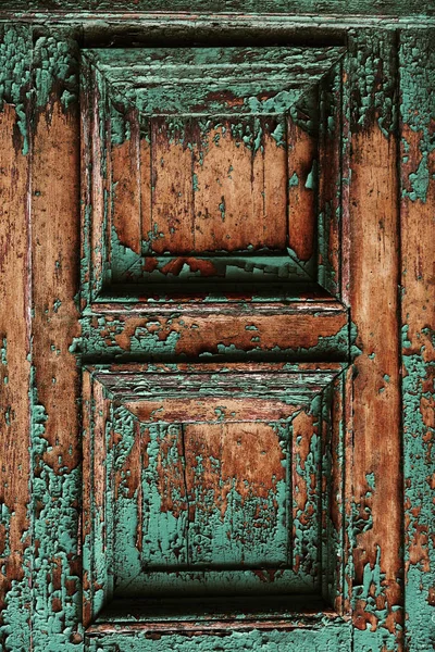 Arka plan doku duvar eski boya peeling ile. Eski ahşap arka plan ağaç eski boya artıkları parçaları kalıntıları ile. Doku eski ağaç bir kurulu ile boya, antika arka plan soyulması boya