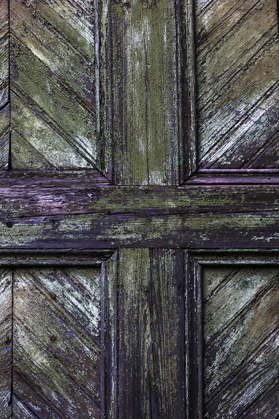 Arka plan doku duvar eski boya peeling ile. Eski ahşap arka plan ağaç eski boya artıkları parçaları kalıntıları ile. Doku eski ağaç bir kurulu ile boya, antika arka plan soyulması boya