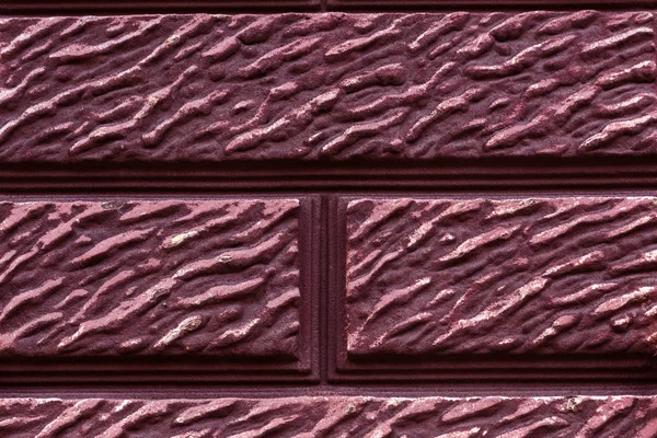 old art texture of plaster brick wall. Painted bad scratched surface in fissures of painted stucco of stone brick wall with petal texture. rubbed facade of building with damaged plaster background