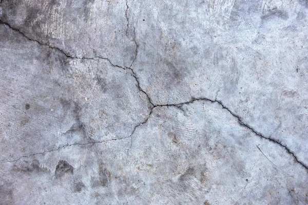 Vintage çatlaklar arka plan. Arka plan yüzeyi ile yaratıcı çatlaklar. Düzen için yaratıcı tasarım için arka plan olarak Web çatlaklar. doku derin çatlaklar ağ ile çimento tabakasının taş yüzeydir