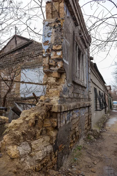 Interior of the destroyed buildings of old factory. ruins of an industrial enterprise, dark fragments destroyed factory premises at plant as result of economic crisis Catacombs, basement, tunnel