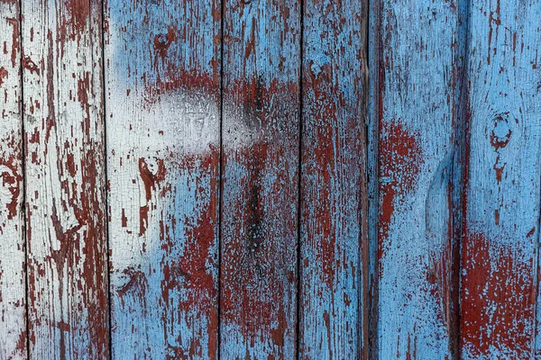 古い塗料を剥離と背景のテクスチャの壁 木の上の古いペイントのスクラップの部分の遺骨と古い木製の背景 古い木 ペンキ 塗料を剥離ヴィンテージ背景ボードの質感 — ストック写真