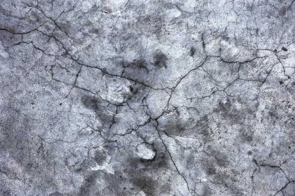 Vintage çatlaklar arka plan. Arka plan yüzeyi ile yaratıcı çatlaklar. Düzen için yaratıcı tasarım için arka plan olarak Web çatlaklar. doku derin çatlaklar ağ ile çimento tabakasının taş yüzeydir