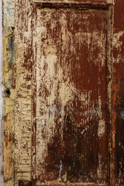 Arka plan doku duvar eski boya peeling ile. Eski ahşap arka plan ağaç eski boya artıkları parçaları kalıntıları ile. Doku eski ağaç bir kurulu ile boya, antika arka plan soyulması boya
