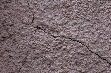 Vintage çatlaklar arka plan. Arka plan yüzeyi ile yaratıcı çatlaklar. Düzen için yaratıcı tasarım için arka plan olarak Web çatlaklar. doku derin çatlaklar ağ ile çimento tabakasının taş yüzeydir