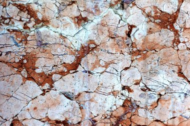 pembe doğal mermer. güzel kırmızımsı kahverengi iç dekoratif taş mermer soyut çatlaklar ve yüzeyde lekeleri.