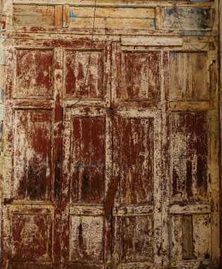 Arka plan doku duvar eski boya peeling ile. Eski ahşap arka plan ağaç eski boya artıkları parçaları kalıntıları ile. Doku eski ağaç bir kurulu ile boya, antika arka plan soyulması boya
