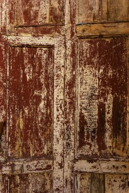 Arka plan doku duvar eski boya peeling ile. Eski ahşap arka plan ağaç eski boya artıkları parçaları kalıntıları ile. Doku eski ağaç bir kurulu ile boya, antika arka plan soyulması boya