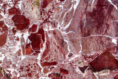 Güzel eski kırmızımsı kahverengi pembe dekoratif taş mermer soyut çatlaklar ve doğal arka yüzeyindeki lekeleri