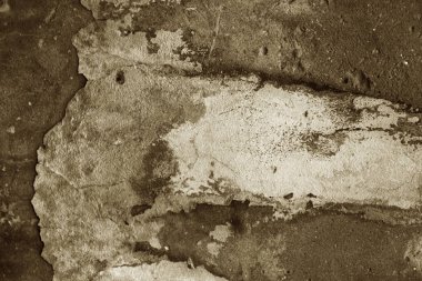 Alçı tuğla duvarın boş eski sanat dokusu. Yaprak dokusuyla boyanmış taş tuğla duvarın çatlaklarıyla kötü çizilmiş yüzey. Hasarlı alçıyla binanın ön cephesini ovaladım.