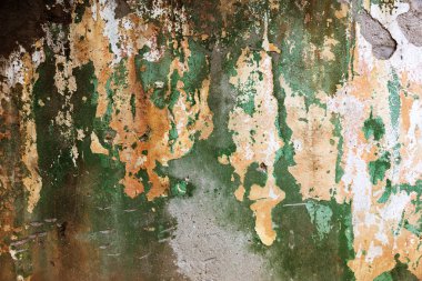 Alçı tuğla duvarın boş eski sanat dokusu. Yaprak dokusuyla boyanmış taş tuğla duvarın çatlaklarıyla kötü çizilmiş yüzey. Hasarlı alçıyla binanın ön cephesini ovaladım.