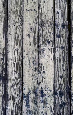 Eski vintage tarzı Beyaz ahşap doku kalıntıları beyaz boya ile boyanmış. Çok yaşlı, grunge, rustik ahşap doku doğal desenler ve çatlaklar ahşap arka plan olarak yüzeyi ile