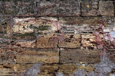 Doğal taştan örülmüş duvar. arka plan olarak kullanılabilir