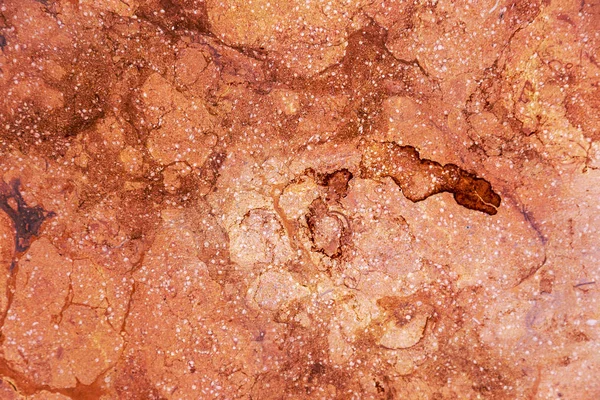 Mermer doku doğal taş arka plan olarak doğal desenli. Mermer taş yüzeyi arka mermer desen. Pembe, kırmızı parlak ve ışık mermer arka plan tasarımı için