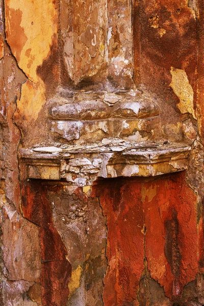 old art texture of plaster brick wall. Painted bad scratched surface in fissures of painted stucco of stone brick wall with petal texture. rubbed facade of building with damaged plaster background