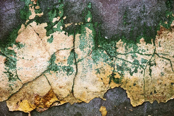 Empty old art texture of plaster brick wall. Painted bad scratched surface in fissures of painted stucco of stone brick wall with petal texture. rubbed facade of building with damaged plaster