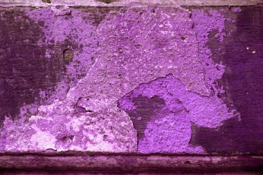 Alçı tuğla duvarın boş eski sanat dokusu. Yaprak dokusuyla boyanmış taş tuğla duvarın çatlaklarıyla kötü çizilmiş yüzey. Hasarlı alçıyla binanın ön cephesini ovaladım.