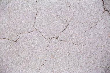 Güzel eski duvar büyük çatlaklar ve doku ile. Arka plan olarak kullanılabilir