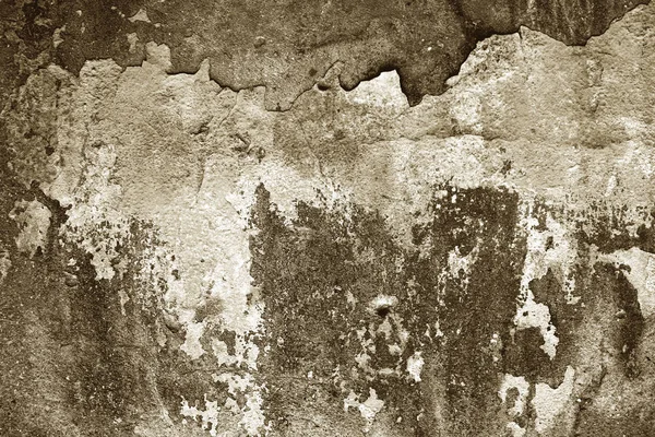 Empty old art texture of plaster brick wall. Painted bad scratched surface in fissures of painted stucco of stone brick wall with petal texture. rubbed facade of building with damaged plaster