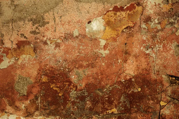 Empty old art texture of plaster brick wall. Painted bad scratched surface in fissures of painted stucco of stone brick wall with petal texture. rubbed facade of building with damaged plaster