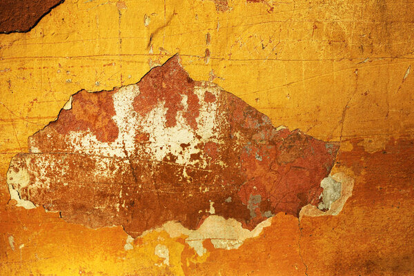Empty old art texture of plaster brick wall. Painted bad scratched surface in fissures of painted stucco of stone brick wall with petal texture. rubbed facade of building with damaged plaster