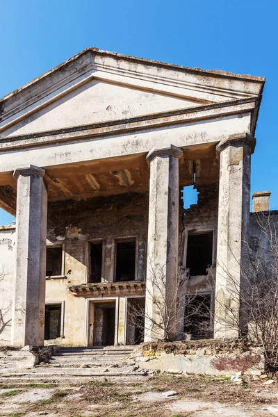 Mystical interior, ruins of an abandoned ruined building of house of culture, theater of USSR. Old destroyed walls, corridor with garbage and dirt. Destroyed molding, plaster ornaments, bas-relief