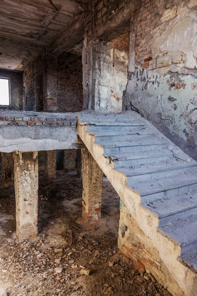 Mystical interior, ruins of an abandoned ruined building of house of culture, theater of USSR. Old destroyed walls, corridor with garbage and dirt. Destroyed molding, plaster ornaments, bas-relief