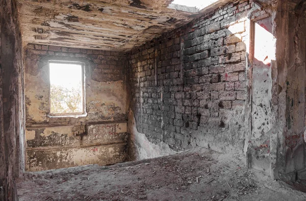 Mystical interior, ruins of an abandoned ruined building of house of culture, theater of USSR. Old destroyed walls, corridor with garbage and dirt. Destroyed molding, plaster ornaments, bas-relief