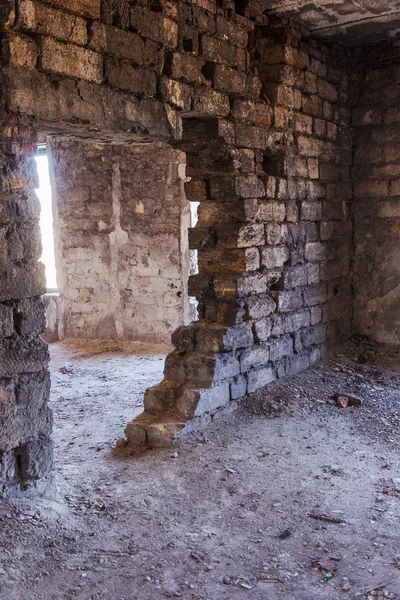 Mystical interior, ruins of an abandoned ruined building of house of culture, theater of USSR. Old destroyed walls, corridor with garbage and dirt. Destroyed molding, plaster ornaments, bas-relief