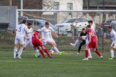 Odessa, Ukrayna-Mart 27, 2019: FC Balkanların First League maçı (Odessa)-FC Miner. Ukrayna 'nın ilk futbol ligi bölgesel ekipler oyunun gergin anları
