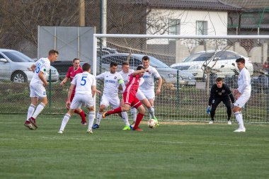 Odessa, Ukrayna-Mart 27, 2019: FC Balkanların First League maçı (Odessa)-FC Miner. Ukrayna 'nın ilk futbol ligi bölgesel ekipler oyunun gergin anları