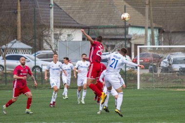 Odessa, Ukrayna-Mart 27, 2019: FC Balkanların First League maçı (Odessa)-FC Miner. Ukrayna 'nın ilk futbol ligi bölgesel ekipler oyunun gergin anları