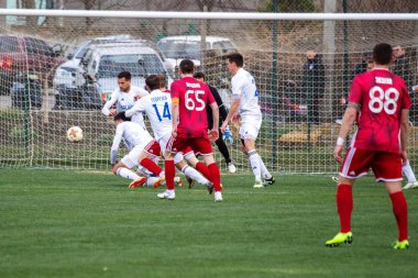 Odessa, Ukrayna-Mart 27, 2019: FC Balkanların First League maçı (Odessa)-FC Miner. Ukrayna 'nın ilk futbol ligi bölgesel ekipler oyunun gergin anları