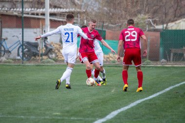 Odessa, Ukrayna-Mart 27, 2019: FC Balkanların First League maçı (Odessa)-FC Miner. Ukrayna 'nın ilk futbol ligi bölgesel ekipler oyunun gergin anları