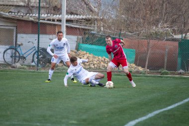 Odessa, Ukrayna-Mart 27, 2019: FC Balkanların First League maçı (Odessa)-FC Miner. Ukrayna 'nın ilk futbol ligi bölgesel ekipler oyunun gergin anları