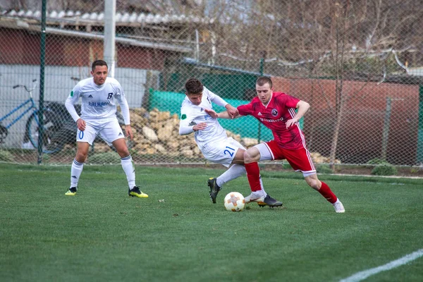 Odessa, Ukrayna-Mart 27, 2019: FC Balkanların First League maçı (Odessa)-FC Miner. Ukrayna 'nın ilk futbol ligi bölgesel ekipler oyunun gergin anları