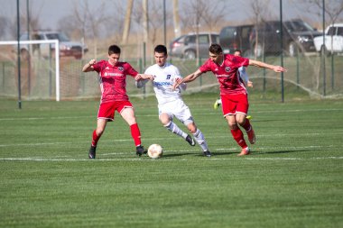 Odessa, Ukrayna-Mart 27, 2019: FC Balkanların First League maçı (Odessa)-FC Miner. Ukrayna 'nın ilk futbol ligi bölgesel ekipler oyunun gergin anları
