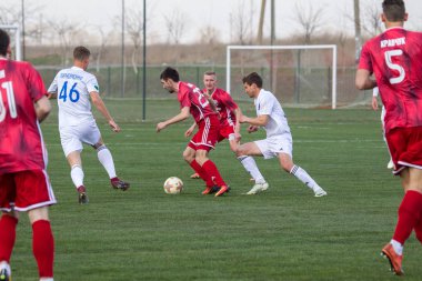 Odessa, Ukrayna-Mart 27, 2019: FC Balkanların First League maçı (Odessa)-FC Miner. Ukrayna 'nın ilk futbol ligi bölgesel ekipler oyunun gergin anları