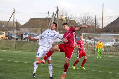 Odessa, Ukrayna-Mart 27, 2019: FC Balkanların First League maçı (Odessa)-FC Miner. Ukrayna 'nın ilk futbol ligi bölgesel ekipler oyunun gergin anları