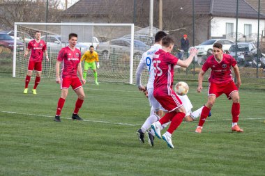 Odessa, Ukrayna-Mart 27, 2019: FC Balkanların First League maçı (Odessa)-FC Miner. Ukrayna 'nın ilk futbol ligi bölgesel ekipler oyunun gergin anları