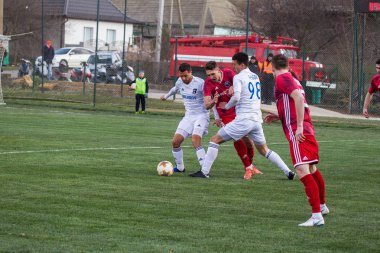 Odessa, Ukrayna-Mart 27, 2019: FC Balkanların First League maçı (Odessa)-FC Miner. Ukrayna 'nın ilk futbol ligi bölgesel ekipler oyunun gergin anları