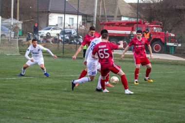 Odessa, Ukrayna-Mart 27, 2019: FC Balkanların First League maçı (Odessa)-FC Miner. Ukrayna 'nın ilk futbol ligi bölgesel ekipler oyunun gergin anları