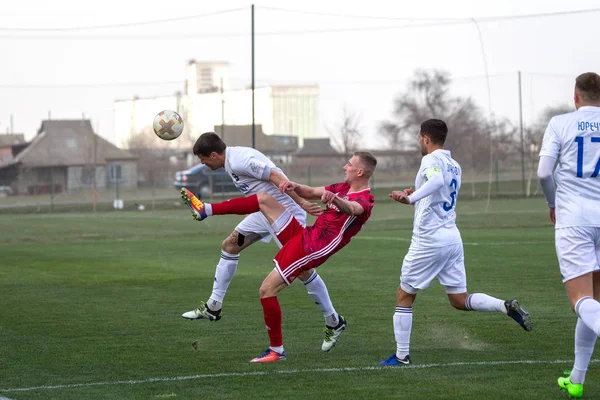 Odessa, Ukrayna-Mart 27, 2019: FC Balkanların First League maçı (Odessa)-FC Miner. Ukrayna 'nın ilk futbol ligi bölgesel ekipler oyunun gergin anları