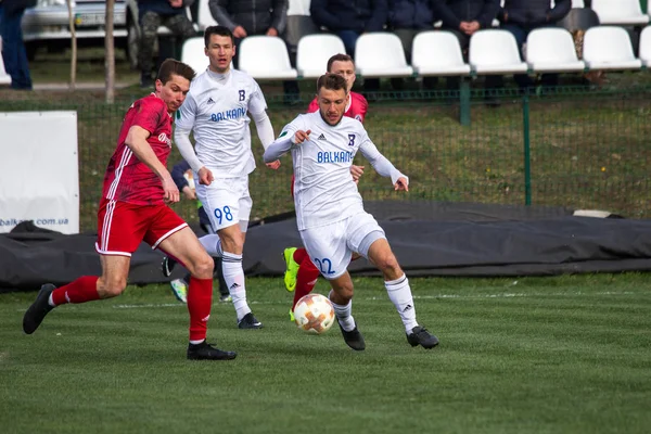 Odessa, Ukrayna-Mart 27, 2019: FC Balkanların First League maçı (Odessa)-FC Miner. Ukrayna 'nın ilk futbol ligi bölgesel ekipler oyunun gergin anları
