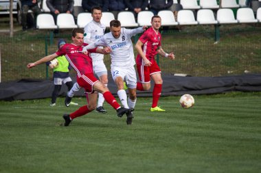 Odessa, Ukrayna-Mart 27, 2019: FC Balkanların First League maçı (Odessa)-FC Miner. Ukrayna 'nın ilk futbol ligi bölgesel ekipler oyunun gergin anları