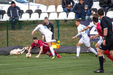 Odessa, Ukrayna-Mart 27, 2019: FC Balkanların First League maçı (Odessa)-FC Miner. Ukrayna 'nın ilk futbol ligi bölgesel ekipler oyunun gergin anları