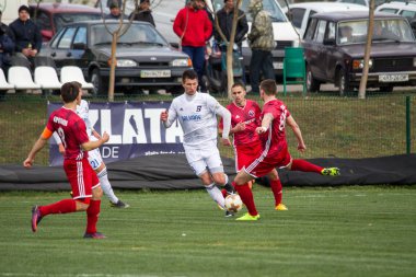 Odessa, Ukrayna-Mart 27, 2019: FC Balkanların First League maçı (Odessa)-FC Miner. Ukrayna 'nın ilk futbol ligi bölgesel ekipler oyunun gergin anları