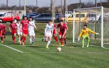 Odessa, Ukrayna-Mart 27, 2019: FC Balkanların First League maçı (Odessa)-FC Miner. Ukrayna 'nın ilk futbol ligi bölgesel ekipler oyunun gergin anları