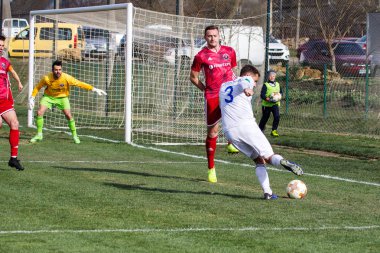 Odessa, Ukrayna-Mart 27, 2019: FC Balkanların First League maçı (Odessa)-FC Miner. Ukrayna 'nın ilk futbol ligi bölgesel ekipler oyunun gergin anları
