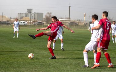 Odessa, Ukrayna-Mart 27, 2019: FC Balkanların First League maçı (Odessa)-FC Miner. Ukrayna 'nın ilk futbol ligi bölgesel ekipler oyunun gergin anları
